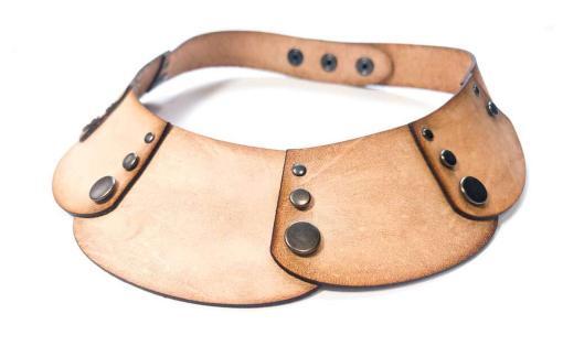 Tan leather choker necklace.