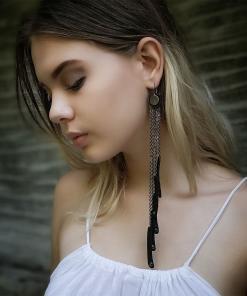 Long leather and chain tassel earrings.