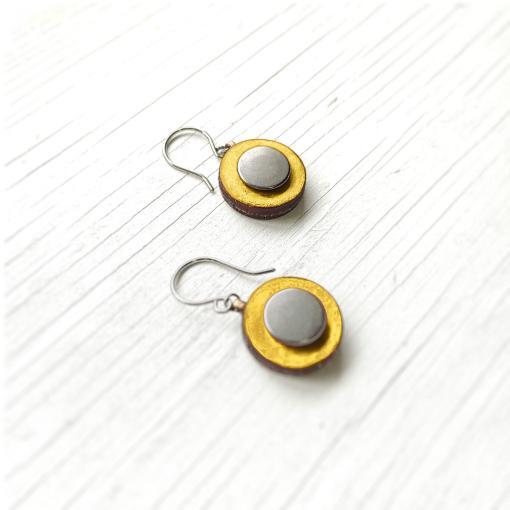 Yellow leather drop earrings.